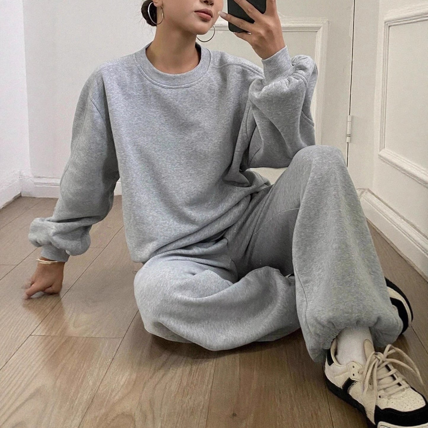 Ladies comfortable outfit of sweatshirt and jogging pants Chic and Style