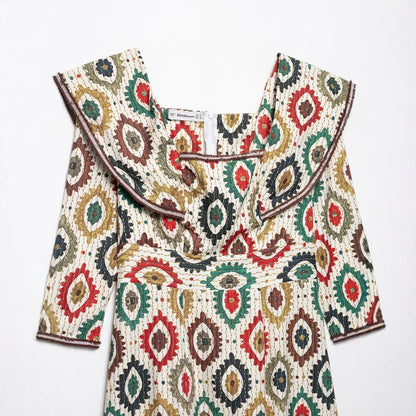 Robe midi pour femmes avec un mélange de motifs élégant et un col volumineux Chic und Stil