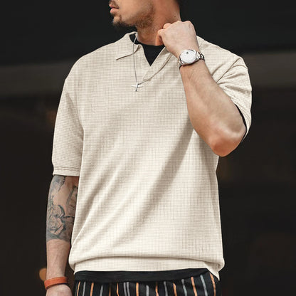 Polo décontracté pour hommes à manches courtes avec design texturé et col à la mode Chic und Stil