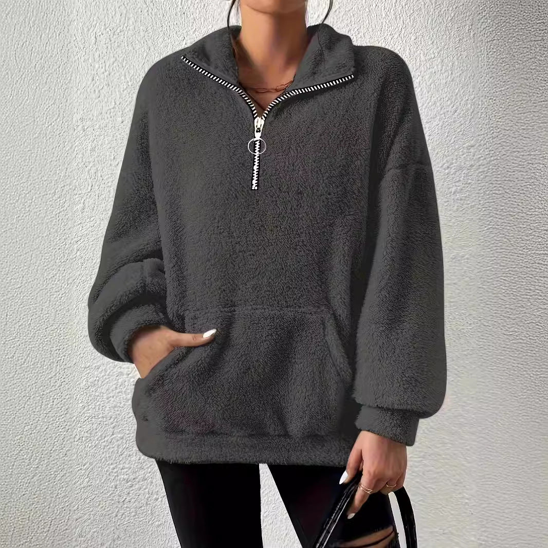 Pull en polaire douillet pour femmes avec demi-fermeture éclair et poches latérales Chic und Stil