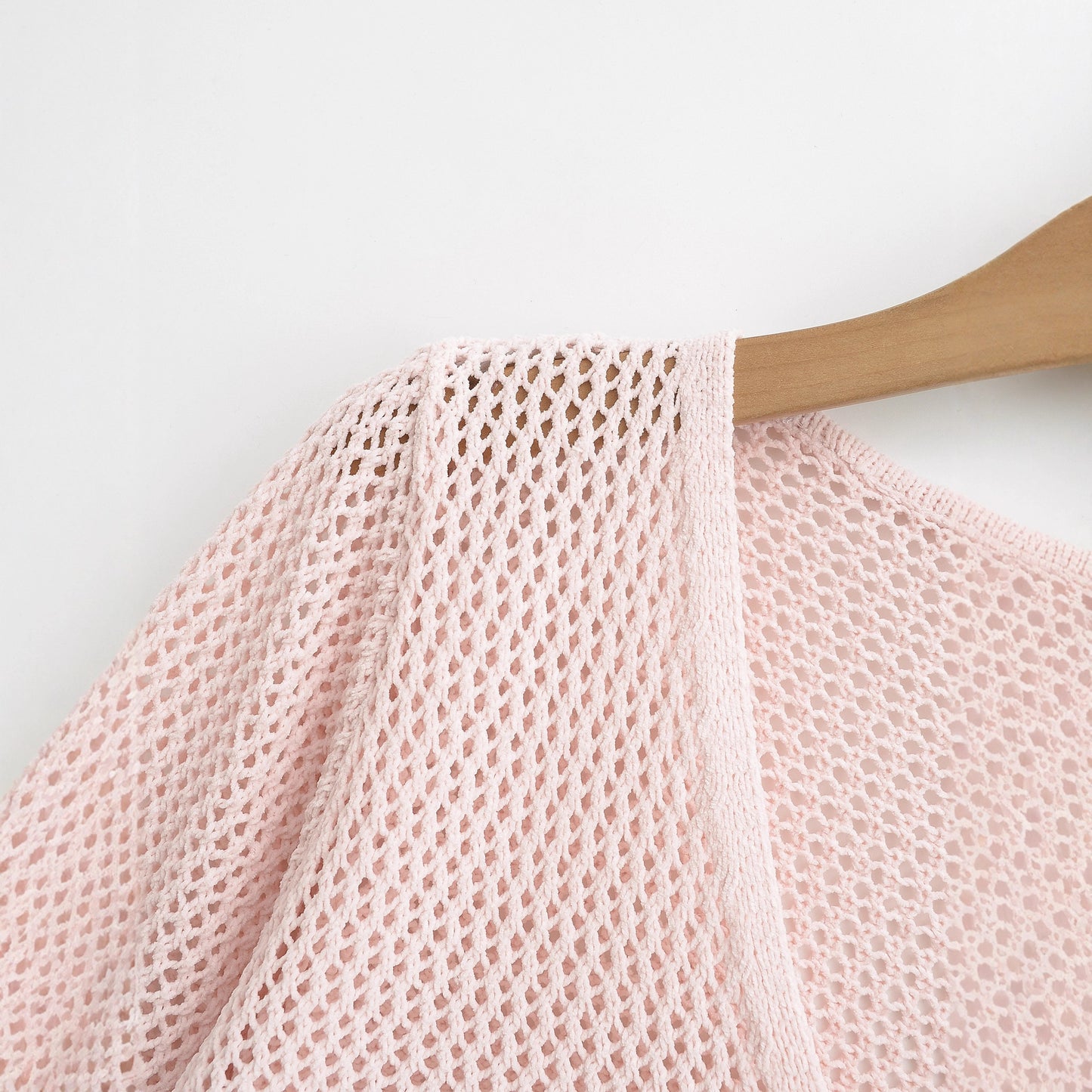 Pull en maille pour femmes avec décolleté en V et lacets Chic und Stil