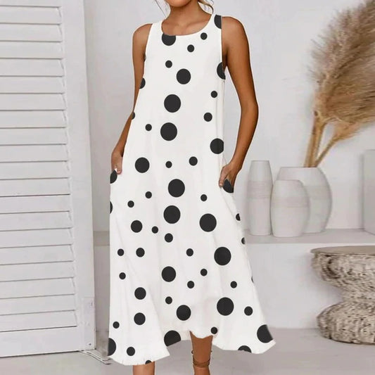 Robe maxi femme avec design à pois asymétrique et poches pratiques Chic und Stil