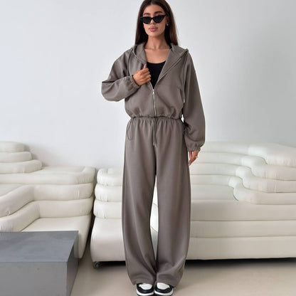 Fashionable women's hoodie with a short cut and matching jogger pants Chic and Style