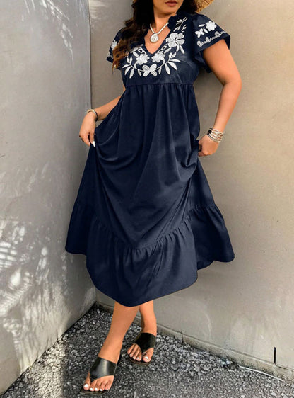 Robe maxi pour femmes avec design floral brodé et jupe volumineuse Chic und Stil