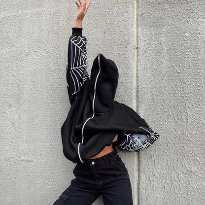 Pull à capuche pour femmes avec un motif unique de toile d'araignée et une coupe généreuse Chic und Stil