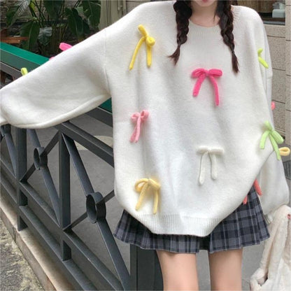 Pull décontracté pour femmes avec des appliqués de nœuds ludiques Chic und Stil