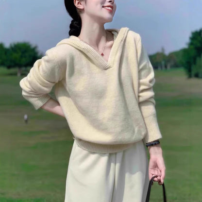 Knitted pullover for women with V-neck and hood Chic and Style