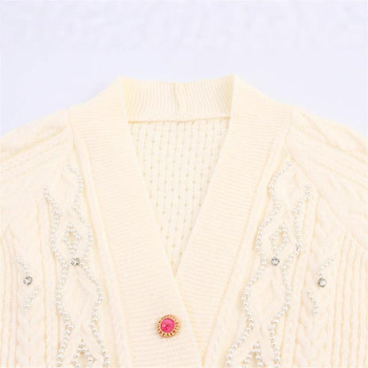 Knitted jacket for women with a detailed textured pattern and elegant ruffle details Chic and Style
