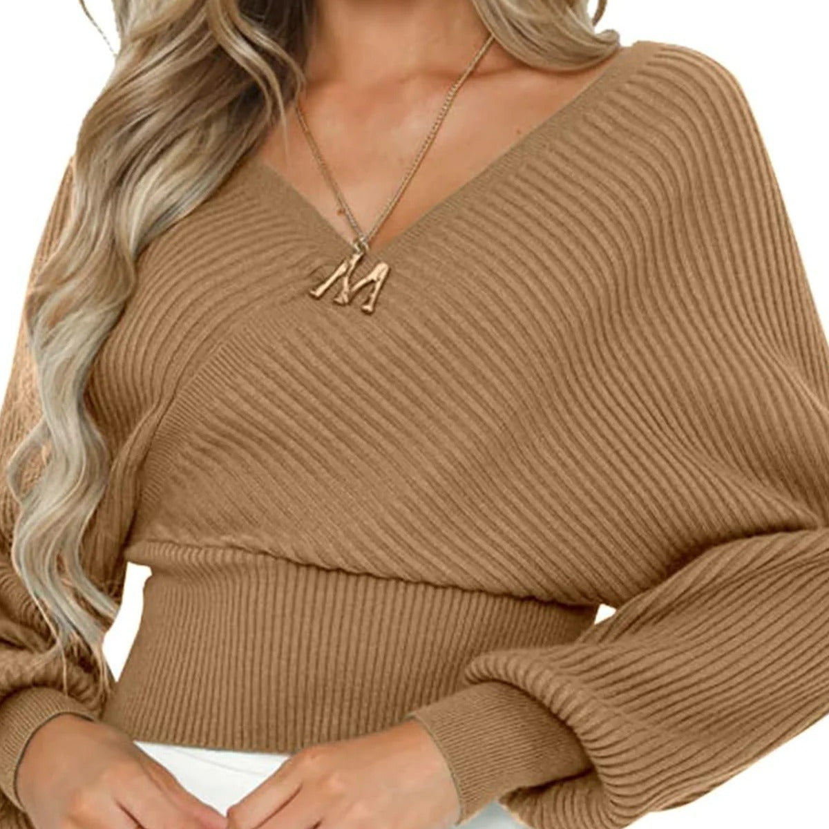 Pull femme décontracté à col en V avec des manches larges et une texture côtelée Chic und Stil