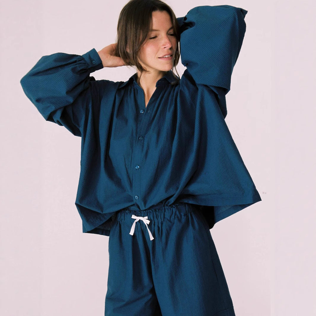 Woman casual outfit combined with loose blouse and shorts Chic and Style