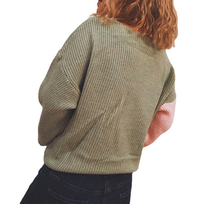 Pull-over enveloppant pour femmes avec un élégant design côtelé et des liens à la mode Chic und Stil
