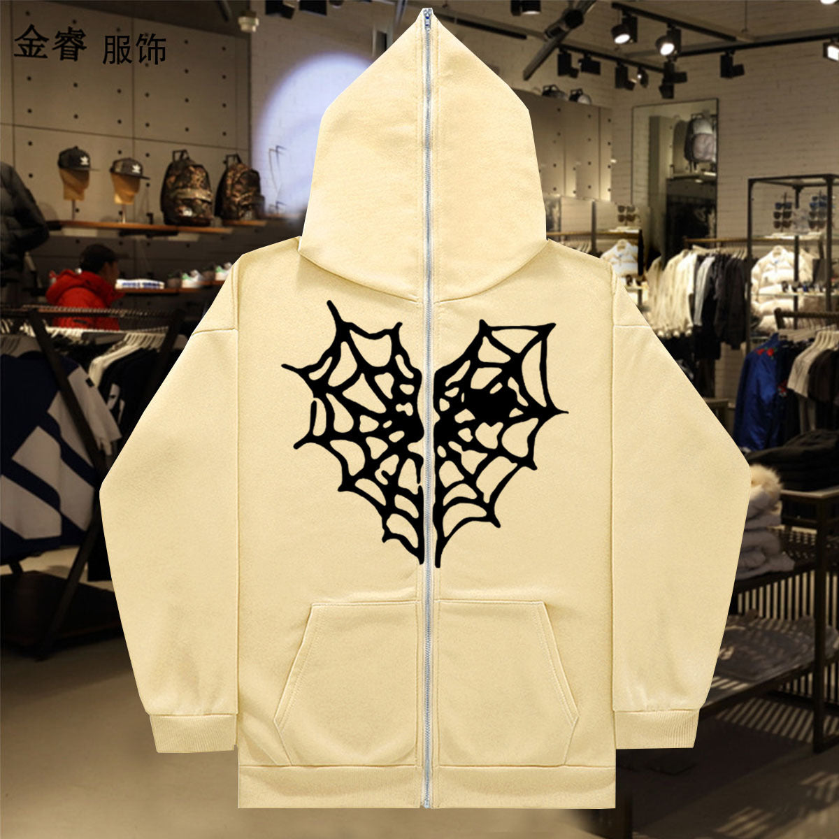 Dame Hoodie avec un design de toile d'araignée saisissant Chic und Stil