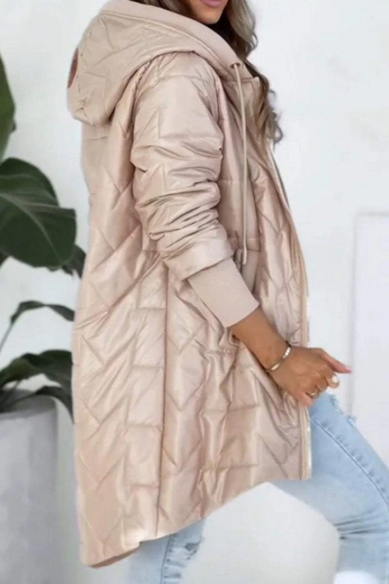 Quilted hooded jacket for women with asymmetric cut and practical pockets Chic and Style