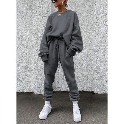 Women casual and comfortable leisure set with an oversized sweater and chic jogging pants and style