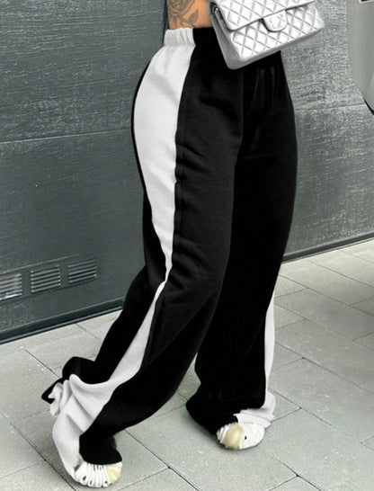 Casual women's sports pants with colorful side inserts and an elastic waistband Chic and Style