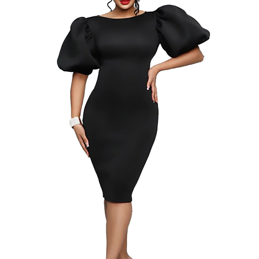 Robe ajustée pour dames avec des manches bouffantes volumineuses Chic und Stil