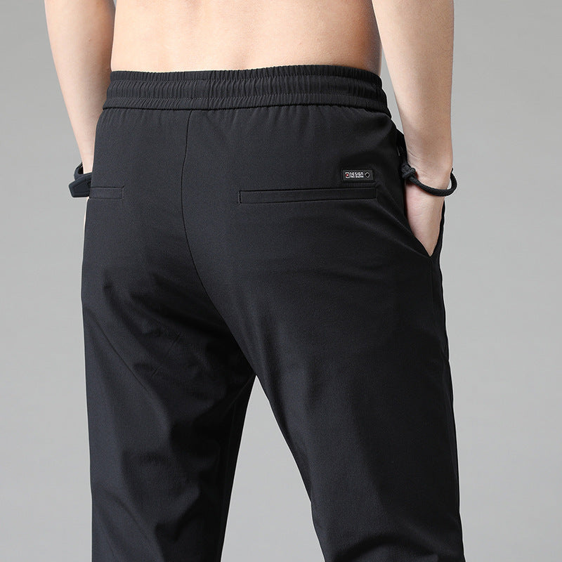 Men's sports pants with adjustable drawstring and zippered pockets on the sides Chic and Style