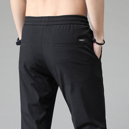 Men's sports pants with adjustable drawstring and zippered pockets on the sides Chic and Style