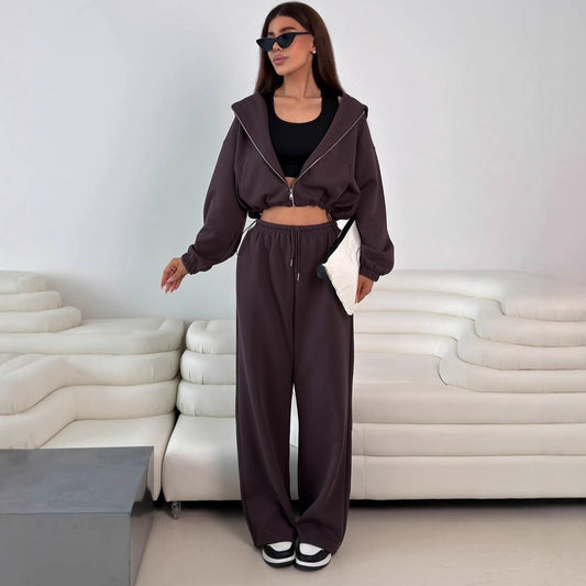 Fashionable women's hoodie with a short cut and matching jogger pants Chic and Style