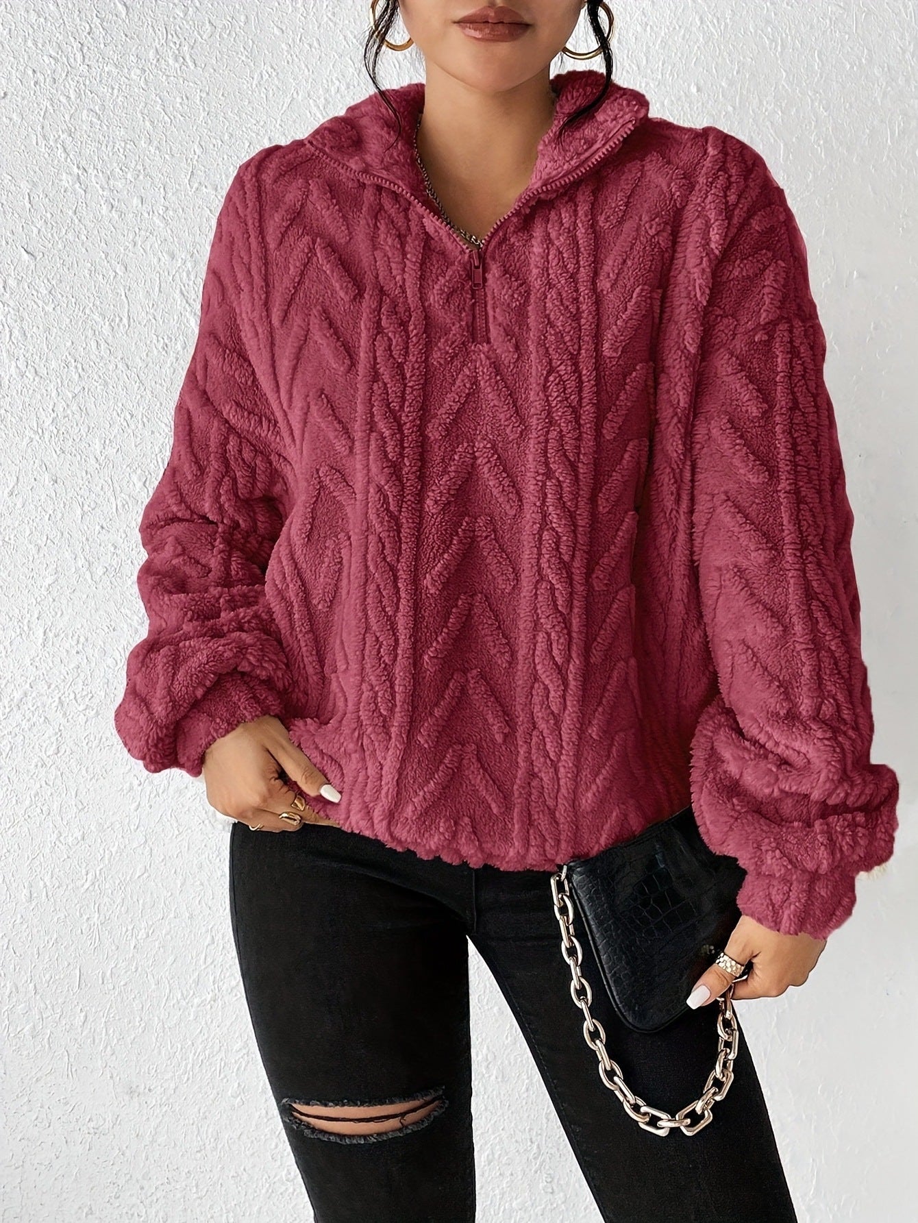 Pull femme en polaire avec col haut et design structuré Chic und Stil