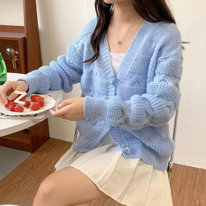 Dame cardigan en tricot confortable avec motif en torsade et détails de boutons Chic und Stil