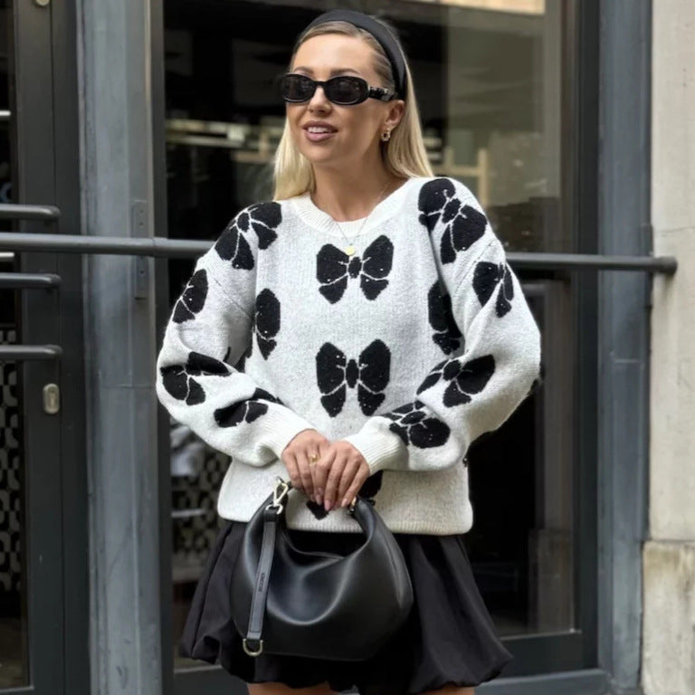 Pull en tricot pour femmes avec un motif floral et un élégant col rond Chic und Stil