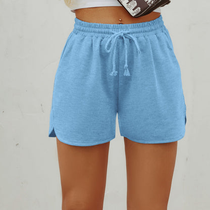 Shorts de sport pour femmes avec taille élastique et fentes latérales Chic und Stil