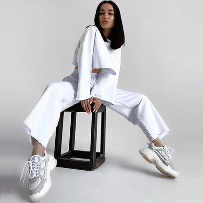 Elegant two-piece lounge set for women with a loose top and high-waisted pants Chic and Style