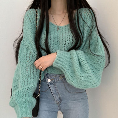 Pull en tricot décontracté pour femmes avec des manches bouffantes volumineuses et une structure en tricot ouverte Chic und Stil