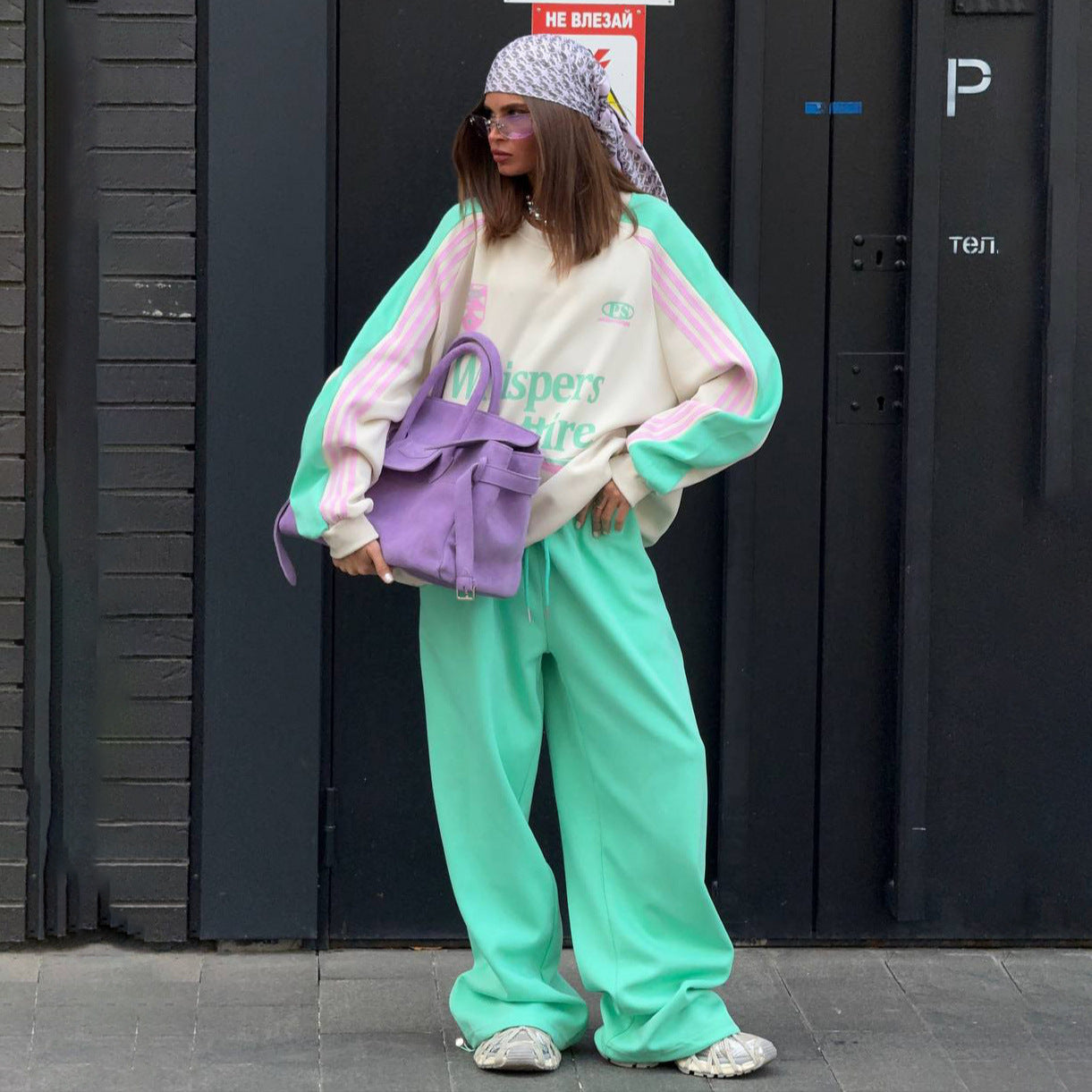 Ladies Casual Sports Outfit with a Relaxed Sweatshirt and Comfortable Jogging Pants Chic and Style