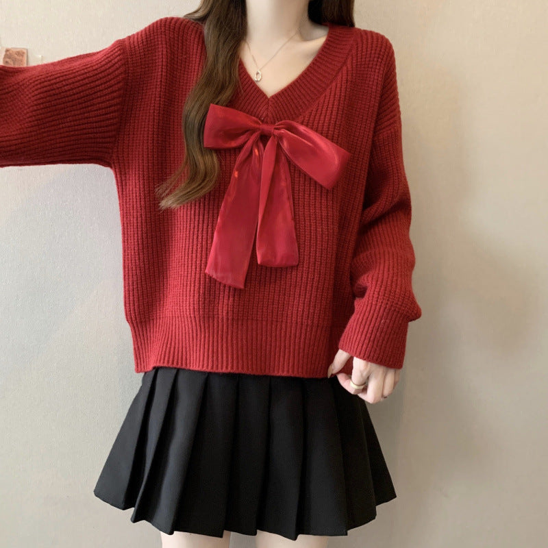 Pull en tricot pour femme avec décolleté en V et accent de nœud décoratif Chic und Stil