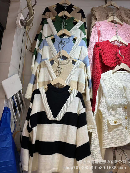 Ladies Oversized V-neck Pullover with trendy striped pattern and open shoulder design Chic and Style