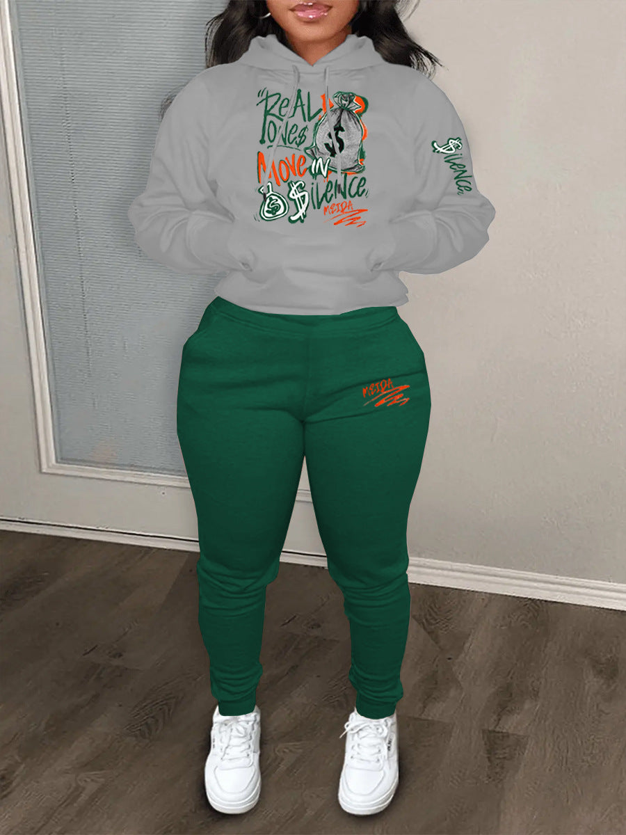 Dames Ensemble de hoodie sportif et de pantalon de jogging avec inscription créative Chic und Stil