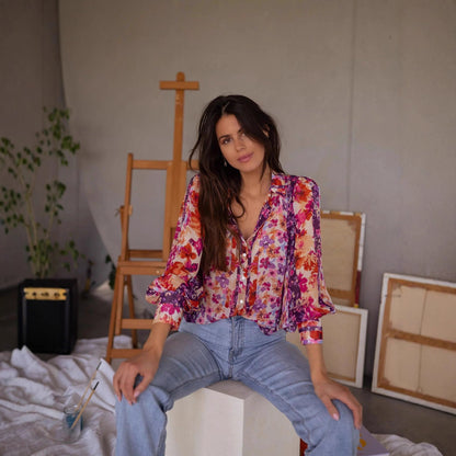 Blouse femme avec des motifs floraux et des manches volantes élégantes Chic und Stil