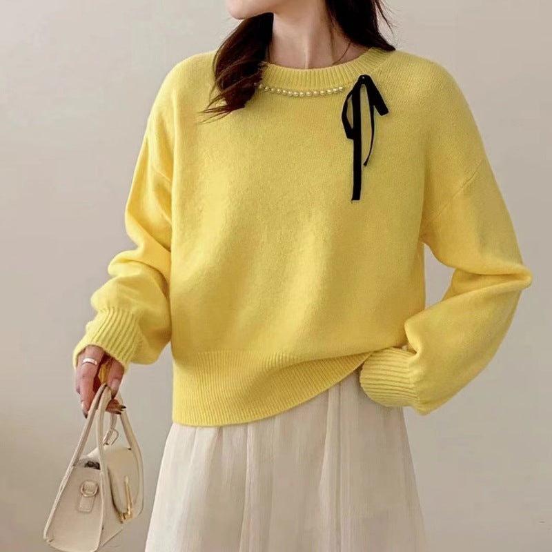 Dames pull mode avec bande décorative et détails en perles Chic und Stil