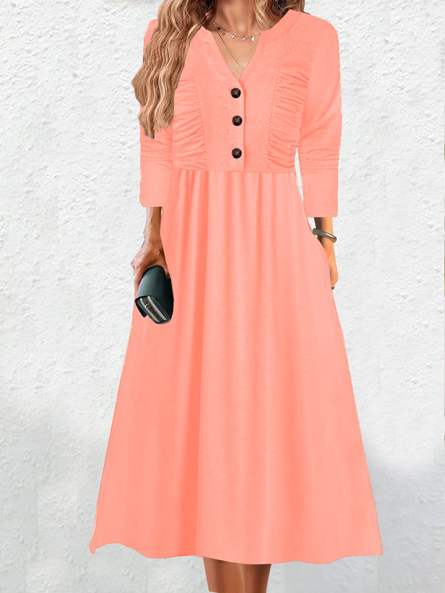 Robe midi femme avec élégant décolleté en V et détails de boutons Chic und Stil
