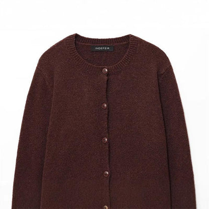 Ladies cozy knit pullover with classic buttons and a round collar Chic and Style