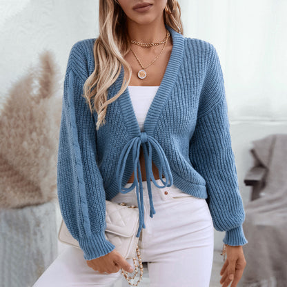Veste tricot femme avec des manches volumineuses et des liens décoratifs Chic und Stil