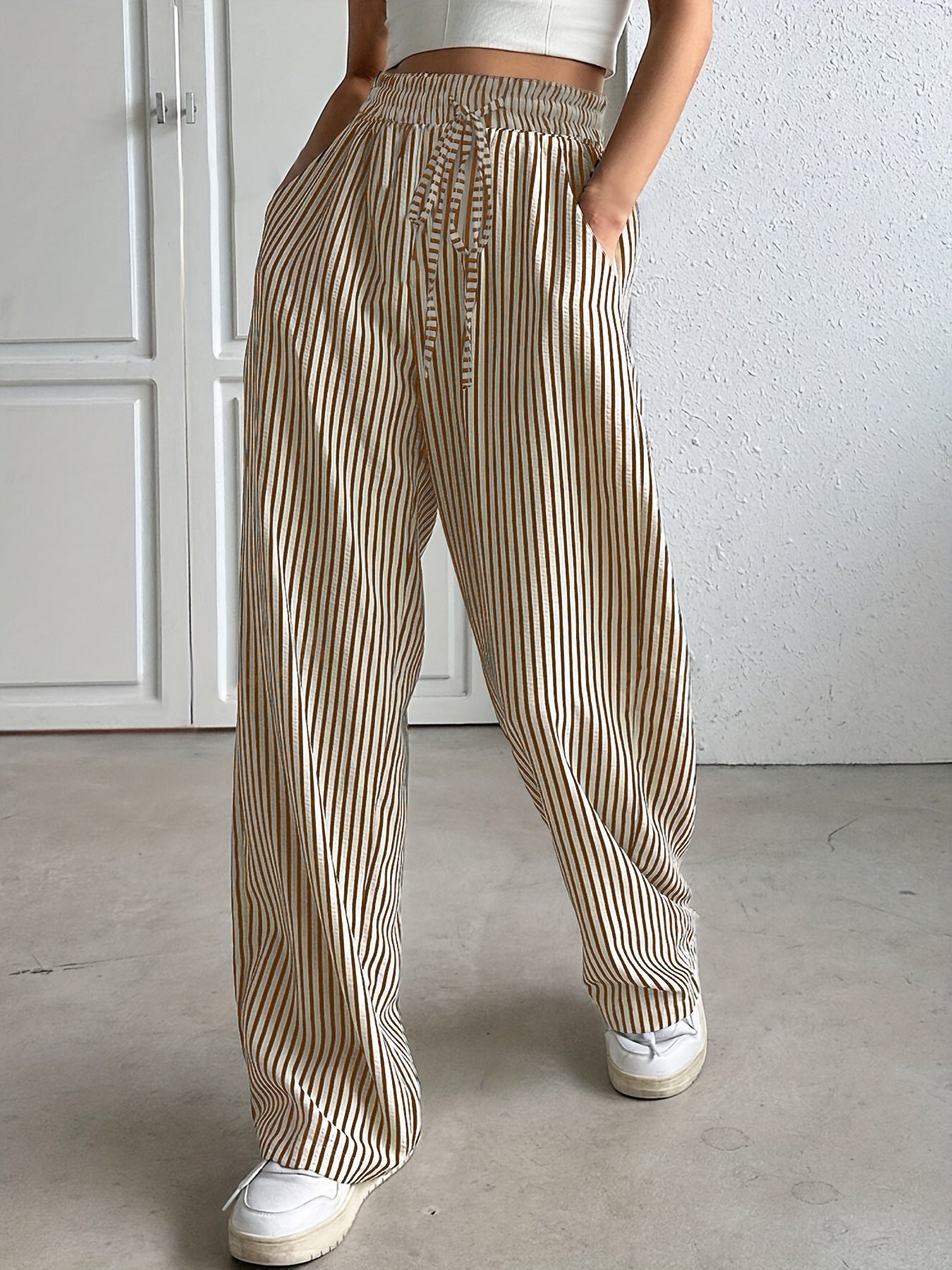 Wide striped pants for ladies with elastic waistband and pockets Chic and Style