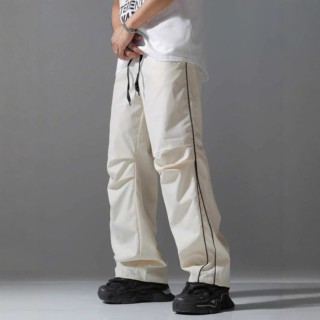 Men's sports pants with elastic waistband and contrasting stripes Chic and Style