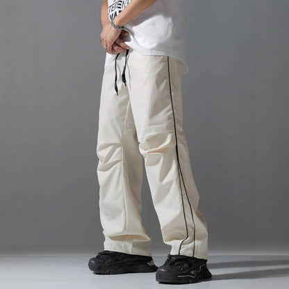 Men's sports pants with elastic waistband and contrasting stripes Chic and Style