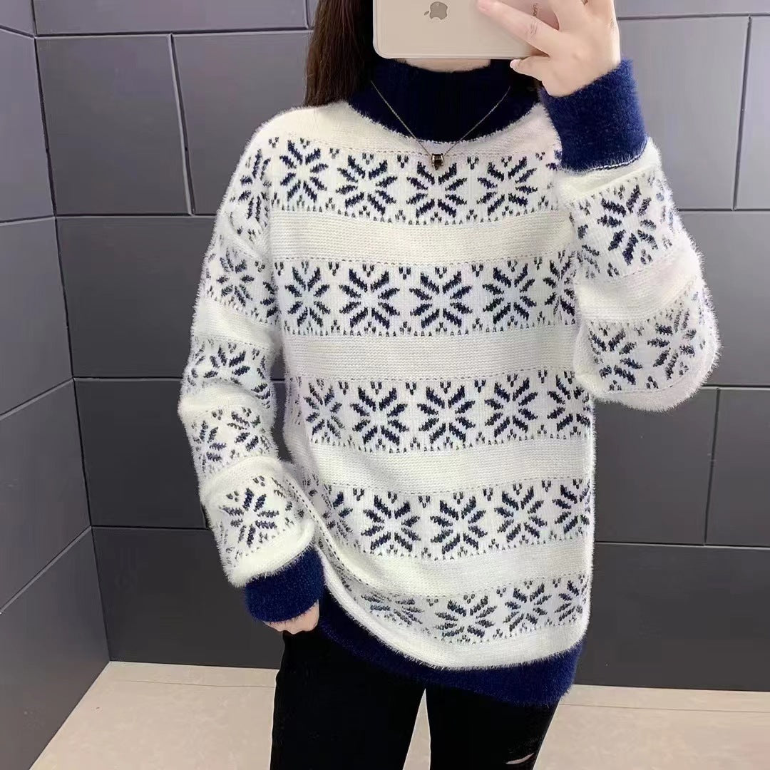 Pull en tricot pour femmes avec un motif moderne de flocons de neige et col montant Chic und Stil