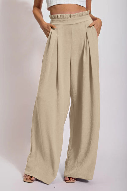 Loose high-waisted pants for women with pleats and elastic waist Chic and Style
