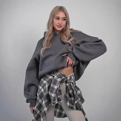 Pull à capuche oversized pour femmes avec une coupe ample et des poches pratiques Chic und Stil