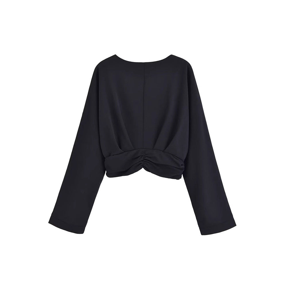 Dames haut élégant avec décolleté en V profond et design de ruché raffiné Chic und Stil