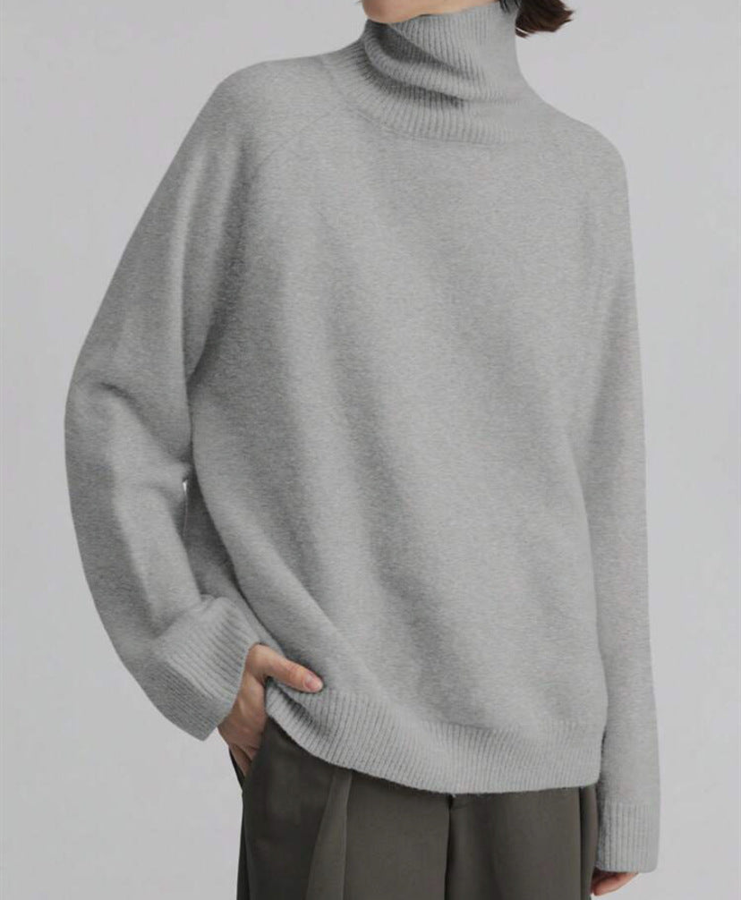 Pull à col roulé féminin à coupe oversize et texture fine Chic und Stil