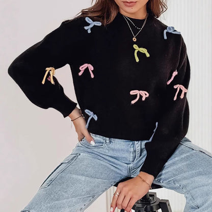 Pull en tricot pour femmes avec des appliques de nœuds ludiques et une coupe décontractée Chic und Stil