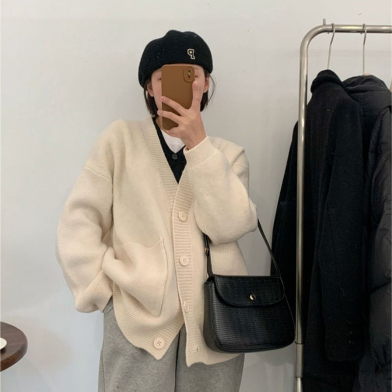 Femme pull-over douillet avec grandes poches et boutonnière intégrale Chic und Stil
