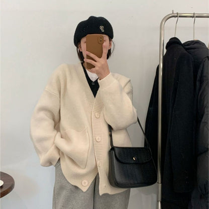Femme pull-over douillet avec grandes poches et boutonnière intégrale Chic und Stil