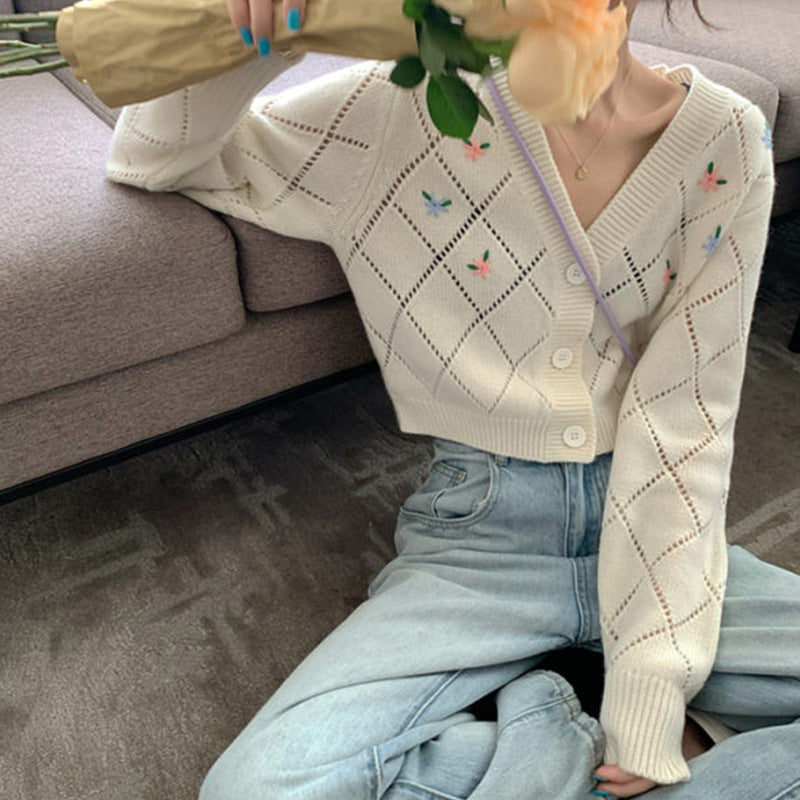 Dames cardigan ludique avec motif floral en losanges et détail boutons Chic und Stil